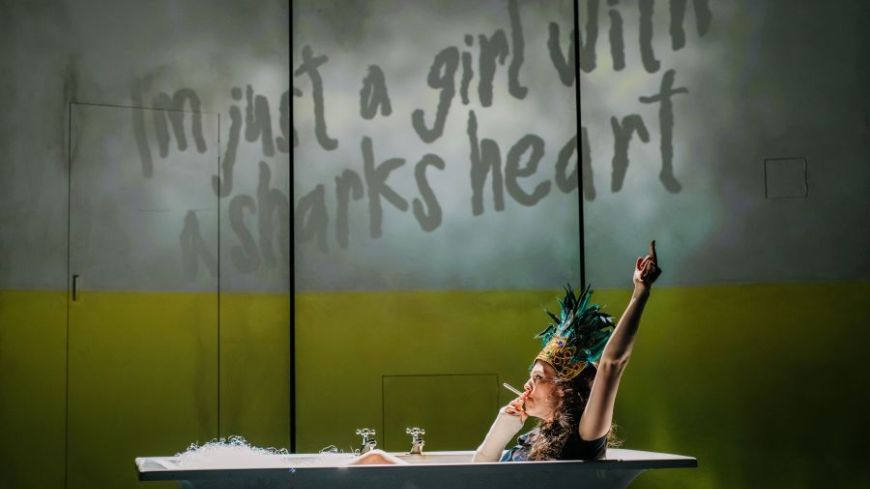 Anna Russell-Martin as Anais, lying in a bath, imagining "I'm just a girl with a shark's heart@. Image by Mihaela Bodlovic.
