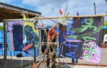 Artist Sarah Kenchington hangs sails at Bridge 8 Hub