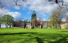 Charlotte Square Garden with the green dome of West Register House rising above equestrian statue Prince Albert