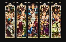 Stain glass window at St Giles Cathedral showing the Crucifixion of Jesus Christ