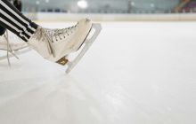 An ice skate on a sports rink