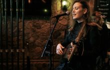 Image Christine Kammerer singing and playing the Lyre