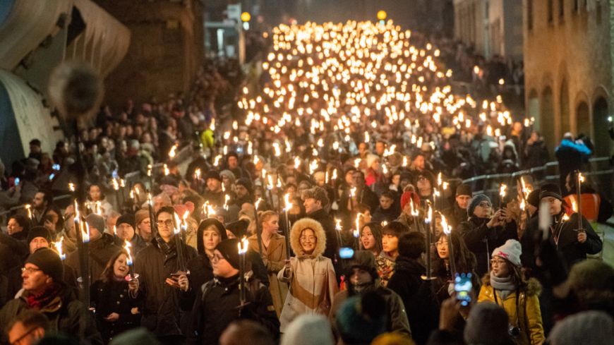 Edinburgh's Hogmanay torchlight procession heading down the Royal Mile