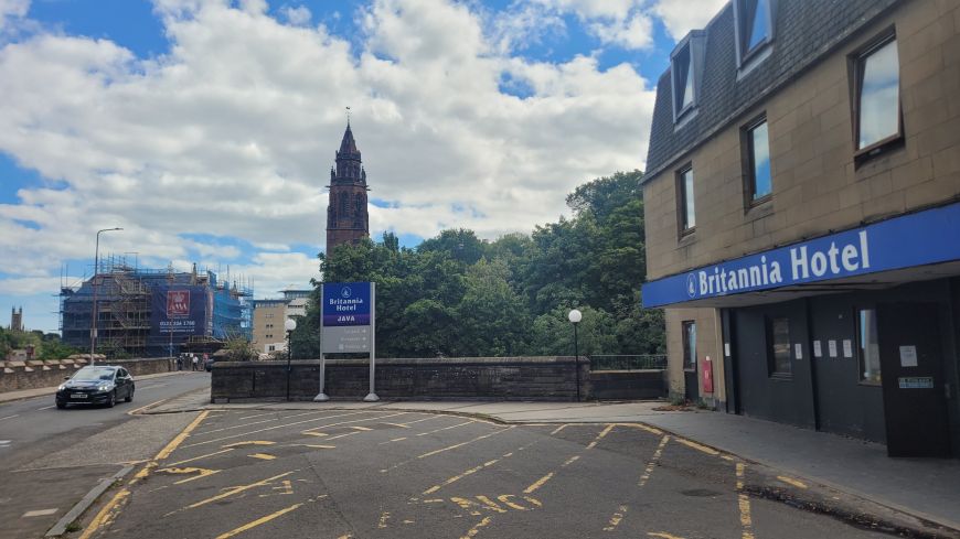 Front of Britannia Hotel, entrance road and woodland below