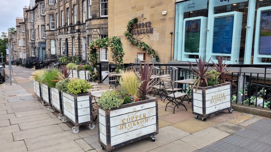 Outside Copper Blossom cocktail bar in Edinburgh in summer