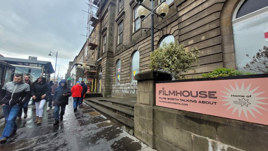 Filmhouse front with graffiti