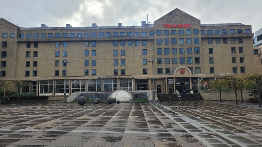 Festival Square - damp and grey - and the Sheraton Grand Hotel