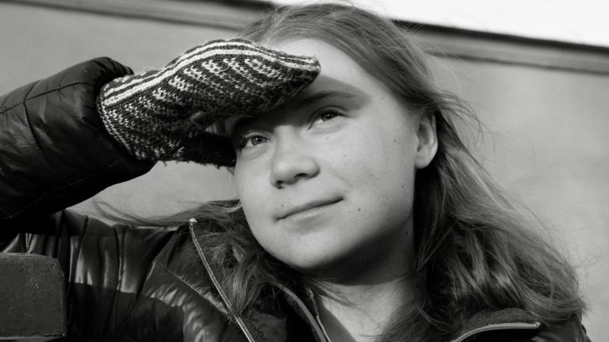 Greta Thunberg - black and white headshot, looking into the future
