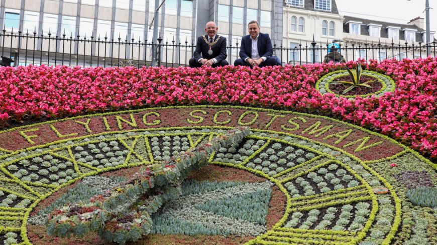 Lord Provost Robert Aldridge and Andrew McLean, National Railway Museum Assistant Director and Head Curator, look down above the 2023 clock