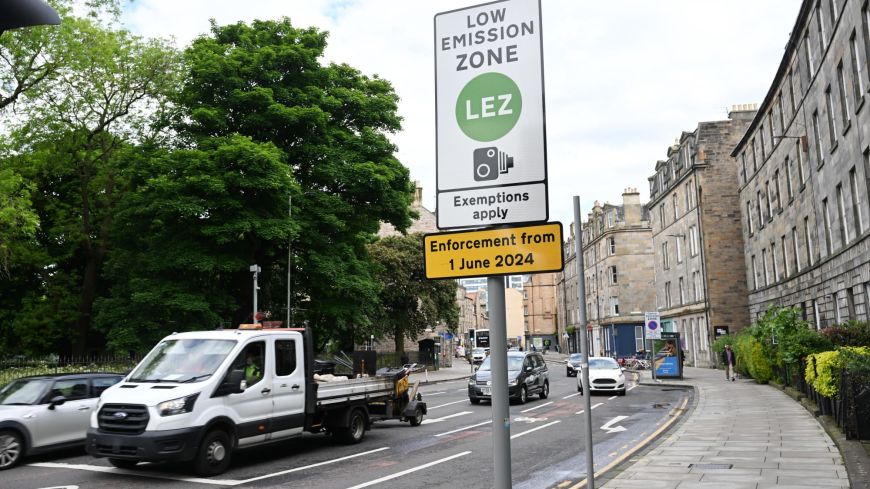 Truck passes Low Emission Zone sign in Edinburgh