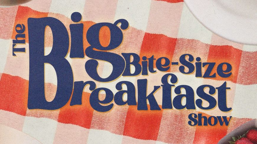 The words The Big Bite Breakfast Show' are written in red lettering on top of a picnic blanket that is red and white checked.