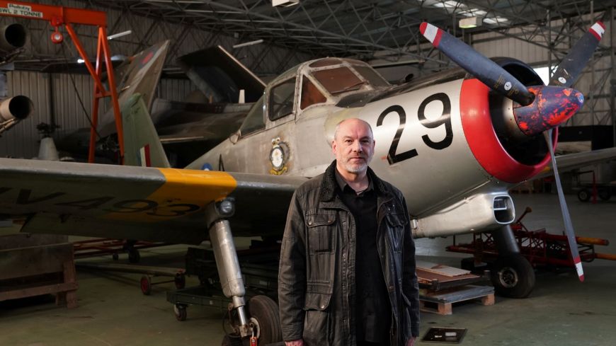 National Museum of Flight curator, Ian Brown in the Conservation Hangar