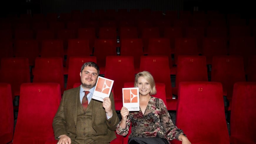 EIFF director Paul Rudd and Festival Producer Emma Boa in Screen 1 with the EIFF programme 2025