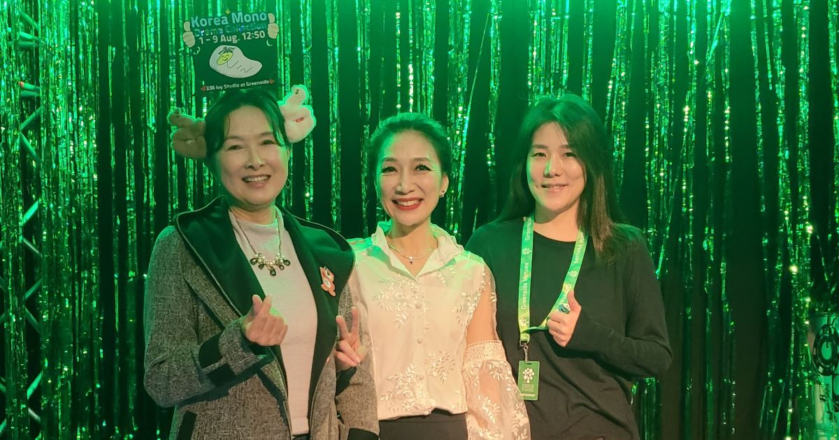 The three women who took part in the monologues are pictued in front of the Zoo signage.